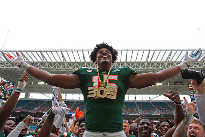 Sep 21, 2019; Miami Gardens, FL, USA; Miami Hurricanes defensive lineman Gregory Rousseau (15) celebrates by wearing the turnover chain after recovering a fumble in the first quarter of a football game against the Central Michigan Chippewas at Hard Rock Stadium. Mandatory Credit: Sam Navarro-USA TODAY Sports